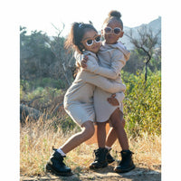 Organic Luna hoodie dress by Be Mi Los Angeles shown in soft fabric with hood and relaxed fit, perfect for casual wear.