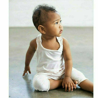 Pink baby romper by Be Mi Los Angeles, soft fabric with cute design, perfect for infant comfort and style.