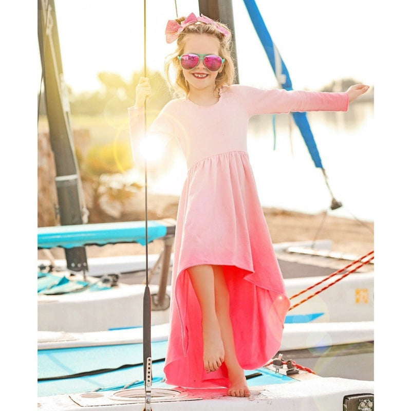 girl wearing ombre tie dye organic dress in pink