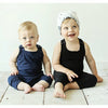 boy braders wearing organic soft rompers and beanie cotton soft playsuit